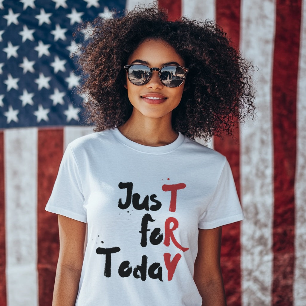 Woman wearing a white t-shirt with 'Just For Today' text in front of an American flag