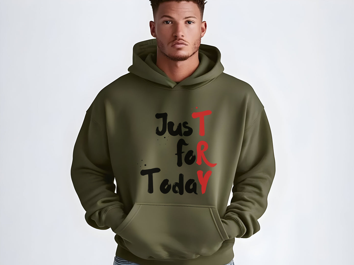 Man wearing a green hoodie with 'Just for Today' text on a white background