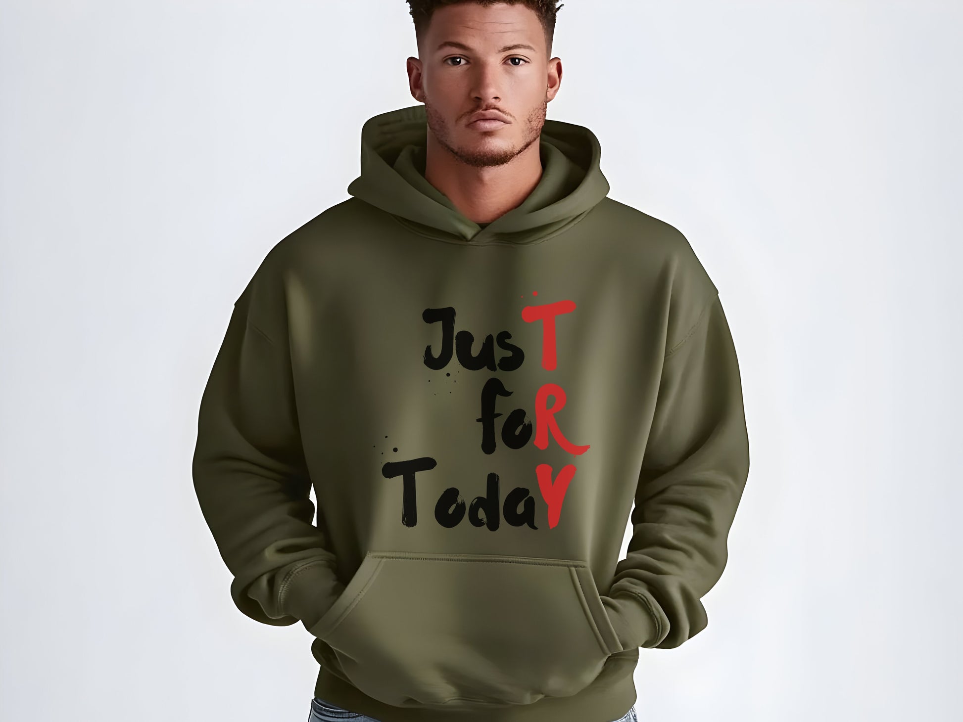 Man wearing a green hoodie with 'Just for Today' text on a white background