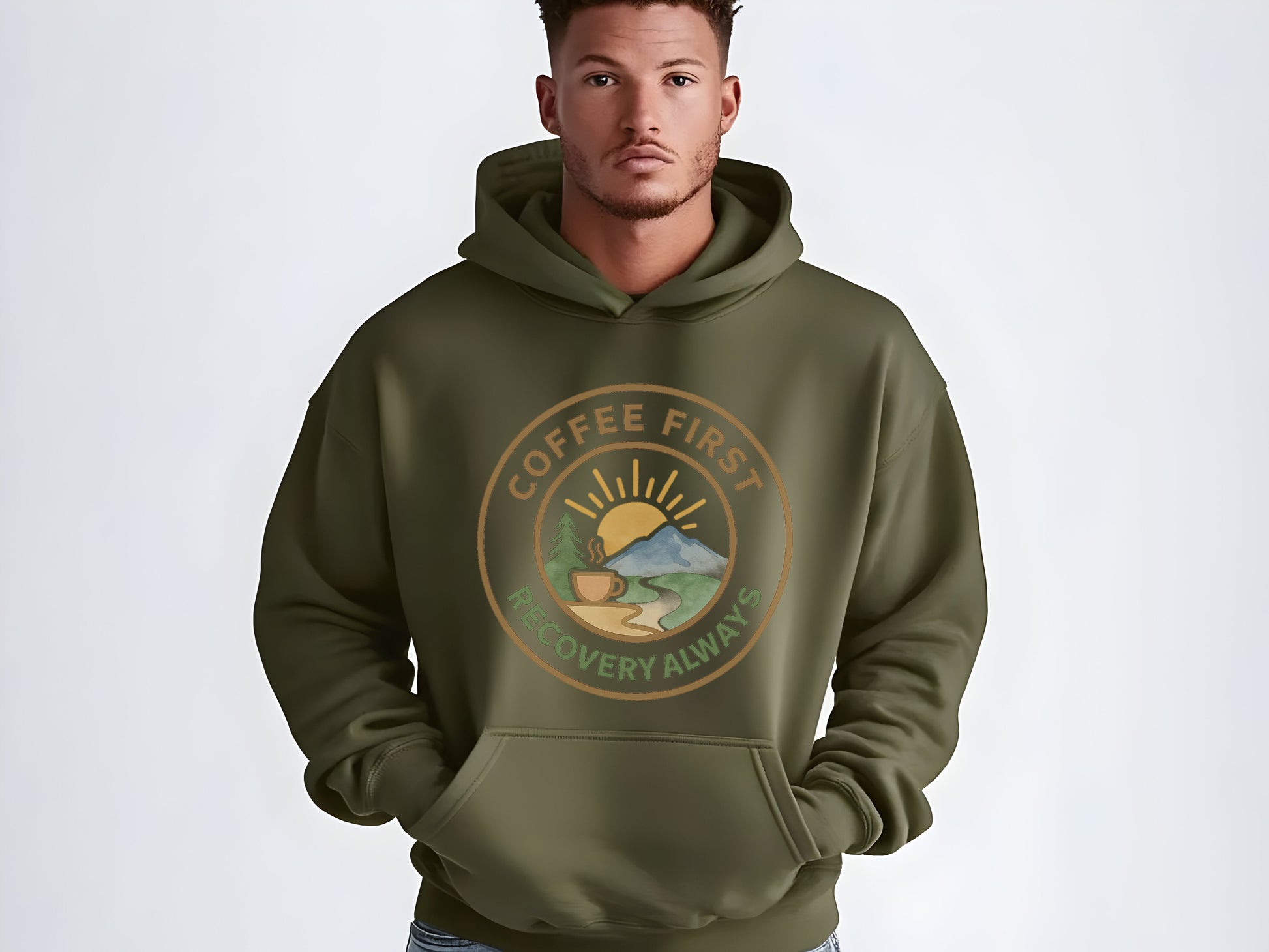 Man wearing a green hoodie with a 'Coffee First, Recovery Always' graphic on a white background