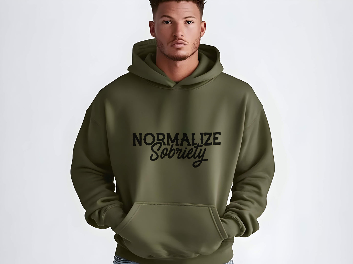 Man wearing a green hoodie with 'Normalize Sobriety' text on a white background