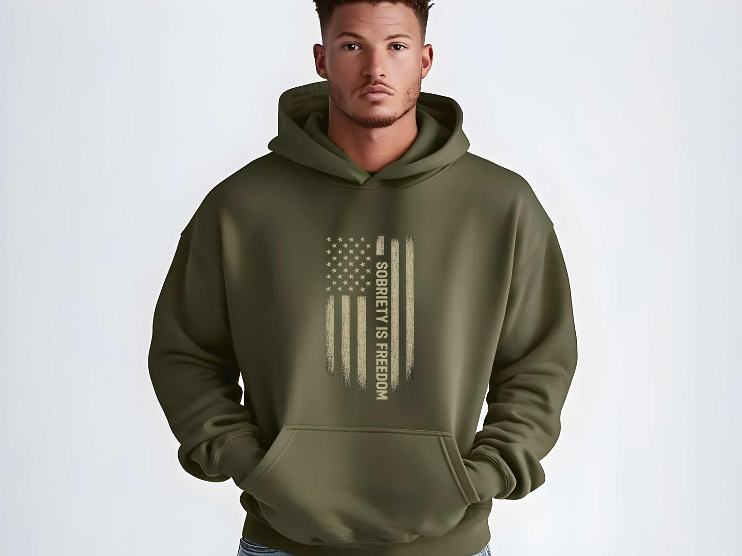 Man wearing a green hoodie with a 'Sobriety is Freedom' message on a white background