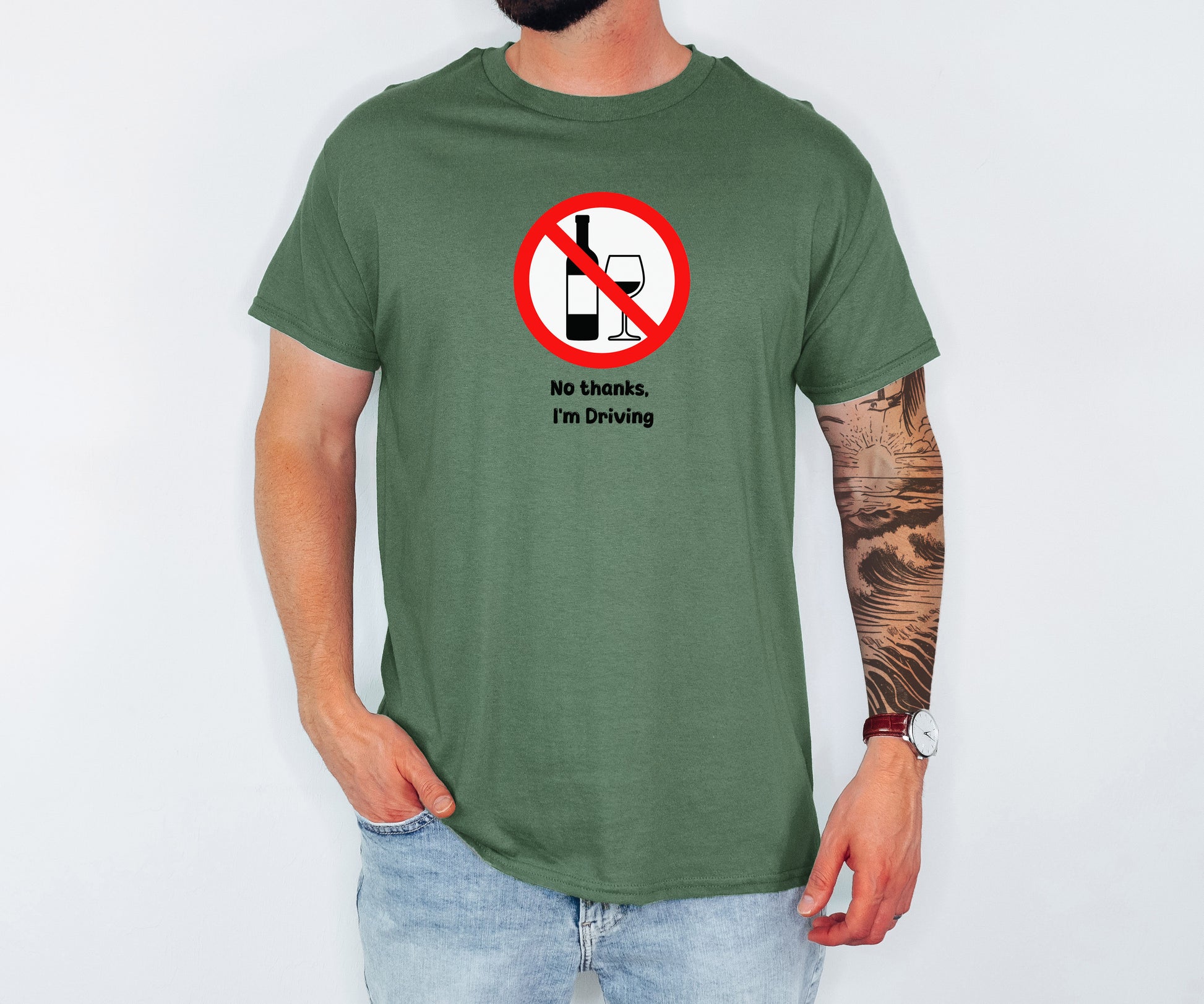 Person wearing a green t-shirt with a humorous 'No thanks, I'm driving' graphic design.