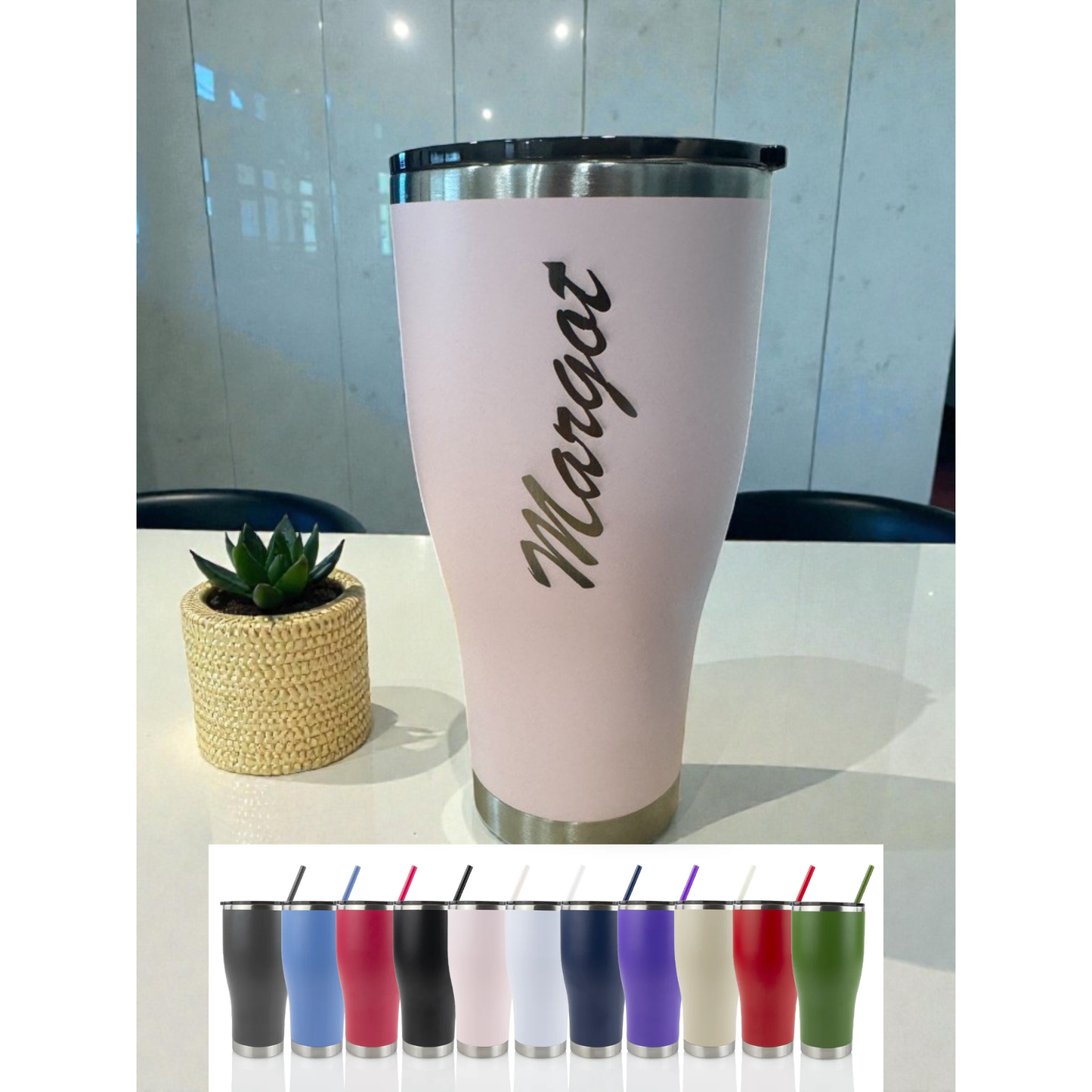 Pink tumbler with engraved name on a reflective surface, surrounded by color swatches.