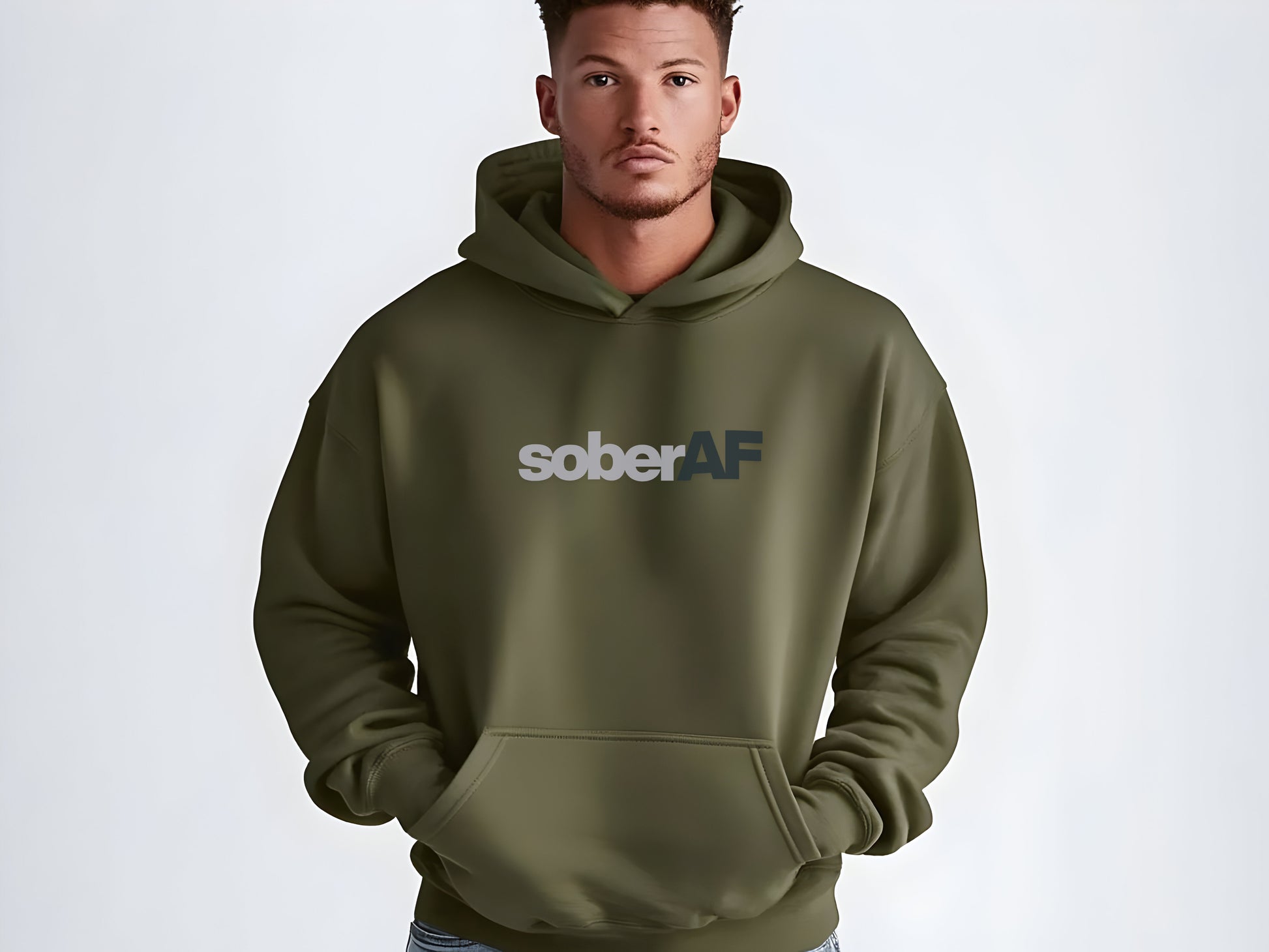 Man wearing a green hoodie with 'soberAF' text on a white background