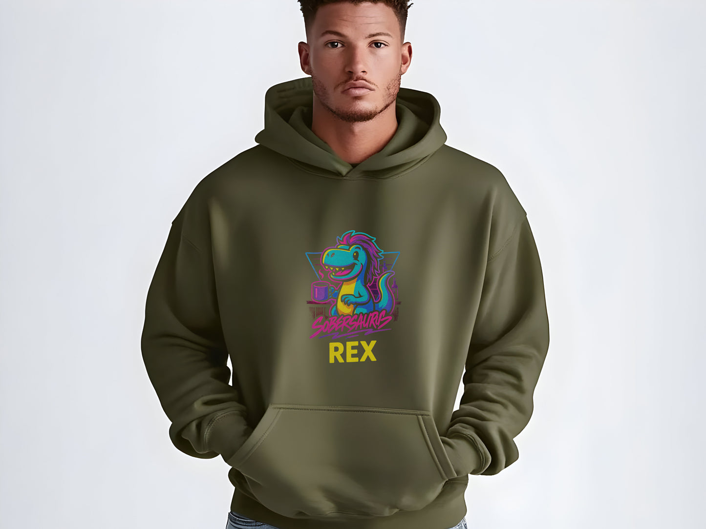 Man wearing a green hoodie with a colorful dinosaur graphic and "Sobersaurus Rex" on a white background