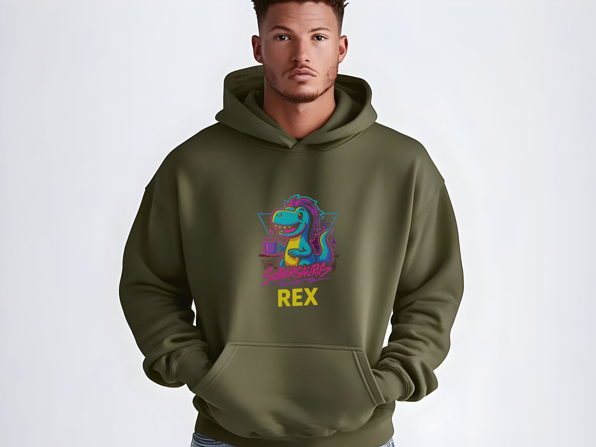 Man wearing a green hoodie with a colorful dinosaur graphic and "Sobersaurus Rex" on a white background